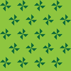 Pattern designed from small windmills created from dark green triangles on an apple green background
