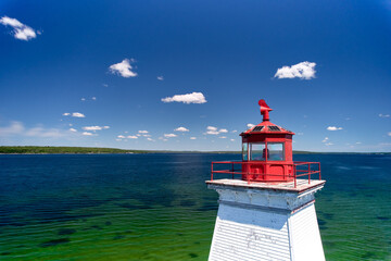 Aerial image close-up of the light turret at the Sandy Point Lighthouse in Nova Scotia