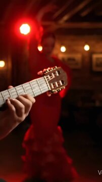 Passionate flamenco dance female and male performer dancing in traditional spanish restaurant with live music and virtuoso guitarist playing music