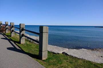 Fototapeta premium fence of a park in bowmanville on the shores of lake ontario