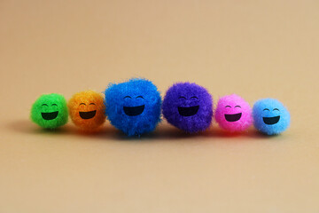 Happy family with their children, colorful plush balls