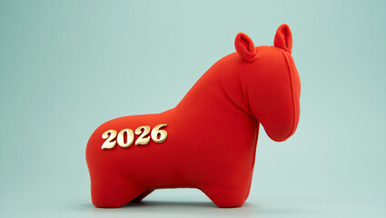 Minimalist red plush horse figure with golden 2026 numbers, perfect symbol for New Year celebrations and the Year of the Horse in soft and playful style.

