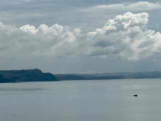 clouds over the sea over looking the Jurassic coast Dorset England 