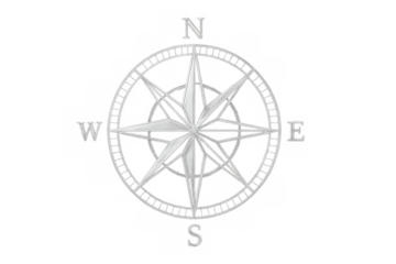 Silver compass rose featuring cardinal directions of north, south, east, and west, isolated on a transparent background for versatile use