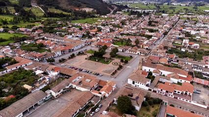 Obraz premium Tibasosa, Boyaca - Colombia. May 8, 2025. Aerial view from a drone, with a temperature of 18 degrees Celsius.