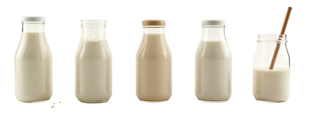 A   four glass milk bottles with a wooden stick sticking out  them.