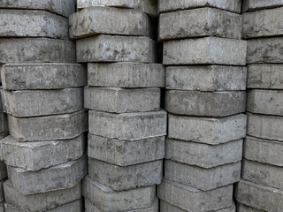 Pile of hexagonal pavers, flooring or concrete block paving, side view