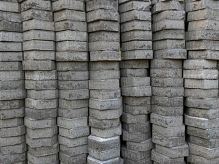 Pile of hexagonal pavers, flooring or concrete block paving, side view