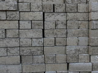 Pile of cube pavers, flooring or concrete block paving, side view