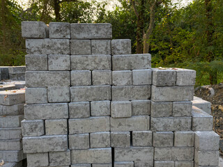 Pile of cube pavers, flooring or concrete block paving, side view