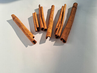 cinnamon sticks on white background