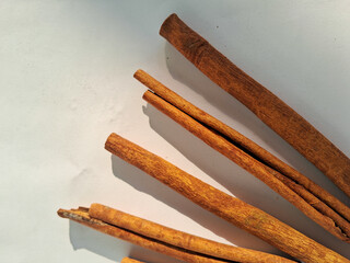 cinnamon sticks on a white background 
