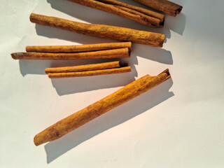 cinnamon sticks on white background