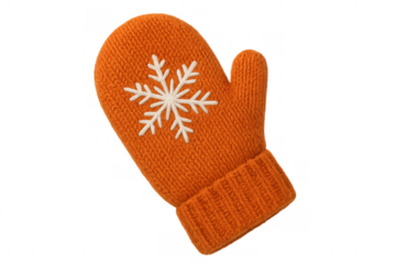 Winter knitted mitten in warm orange color, adorned with intricate white snowflake pattern, resting on transparent backdrop