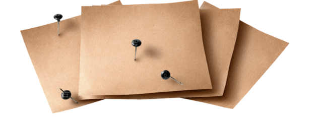 Stacked light brown papers with pins