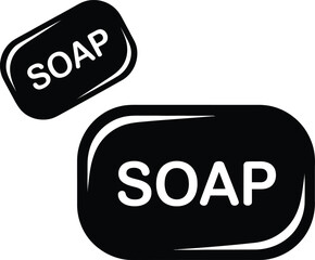 Two black bars of soap with the word soap written on them