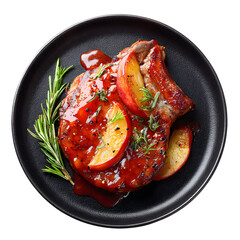 Delicious pork chop with apples and rosemary on a black plate background