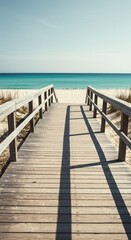 Wooden walkway to turquoise beach