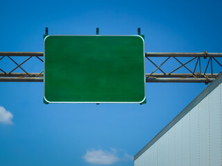 A blank interstate overhead sign with copy space isolated against the sky. abstract concept of future, logistics, journey. signage board for information banner 