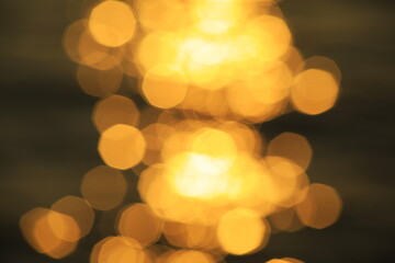 光の道をぼかしたオレンジの背景素材