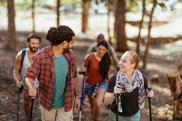 Young and diverse group of friends and hikers hiking together in the mountains of south africa