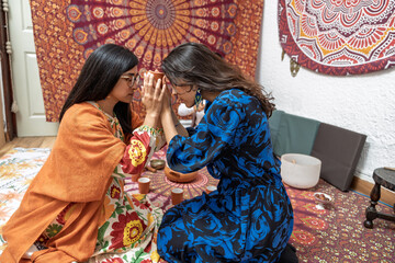 Women sharing organic cocoa in spiritual ceremony