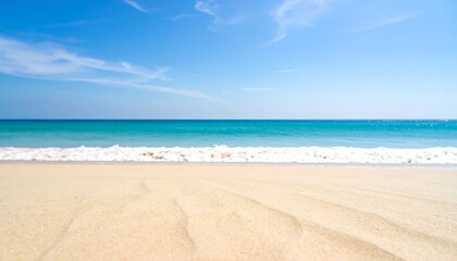 Obraz premium Blurry beach scene with calm ocean and sky