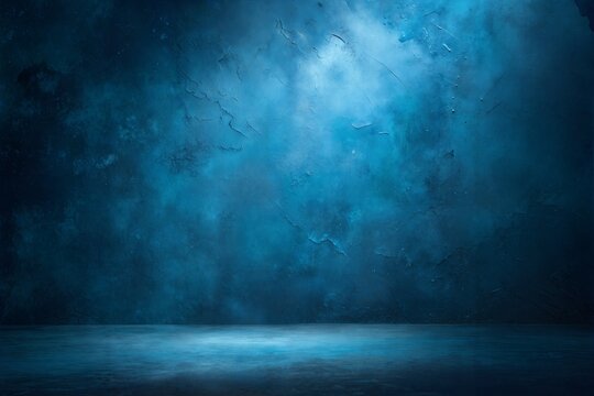 Photo of dark moody abstract background with textured deep blue tones dramatic lighting and a concrete floor for a cinematic feel