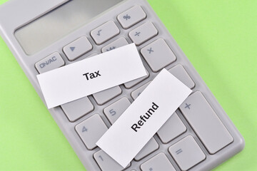Image of tax refunds using tax, refund, and calculator