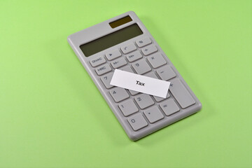 Photo of calculator and Tax
