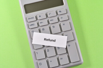 Image of claims refunds and trouble refunds with a calculator and refund