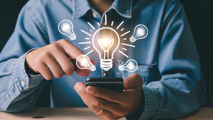 Creative entrepreneur using smartphone to generate innovative new ideas online