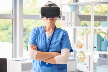 Female doctor in VR glasses at hospital