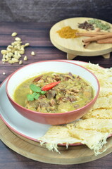 Lamb curry with bread roti jala, indonesian food