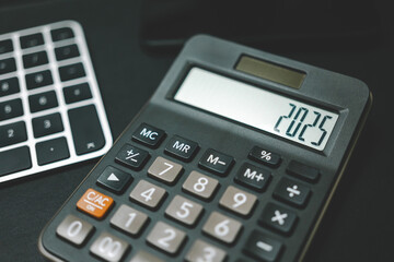 Calculator and forecast for finances in 2025. Money, Budget, tax, investment, financial and savings. calculator with 2025 numbers