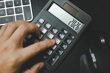 Calculator and forecast for finances in 2026. Money, Budget, tax, investment, financial and savings. calculator with 2026 numbers.