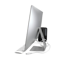 A sleek computer setup featuring a monitor, keyboard, and a compact desktop unit.