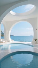 Modern pool with ocean view framed by large circular windows