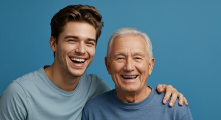 Smiling multigenerational men with arm around shoulder, studio portrait against solid blue background, portraying bond and joy.