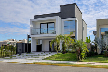 Modern Oceanfront Villa with Pool and Tropical Landscaping