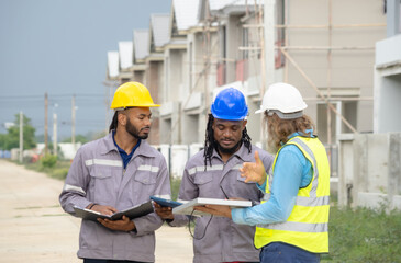 Professional architect and foreman wear head hat talk meeting safety work team check inspection...