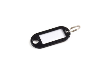 Black plastic key tag isolated on white background