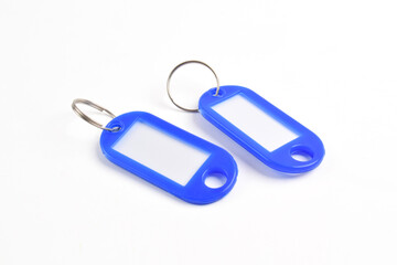 Blue plastic key tag isolated on white background