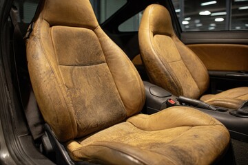 Tan leather car seats, aged look