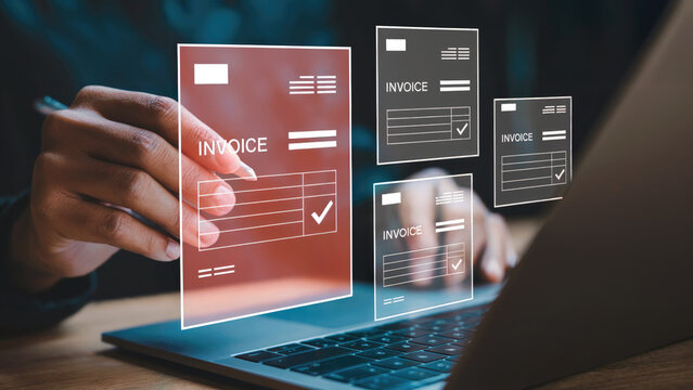 Streamlining payments with digital invoices on laptop for efficient business
