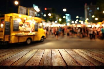 Night food truck market, blurred city background, wooden table