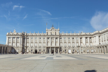 Royal Palace Of Madrid With Wide Courtyard On Clear Blue Sky Day In Spain