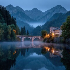 Fototapeta premium Serene mountain lake scene at twilight, stone bridge and castle reflected in calm water