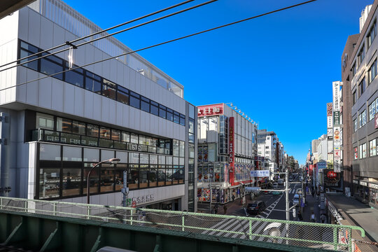 Street in Tokyo with Commercial Buildings and Signage, shin okubo Dec 10 2024
