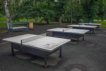 An empty table tennis court on a summer day